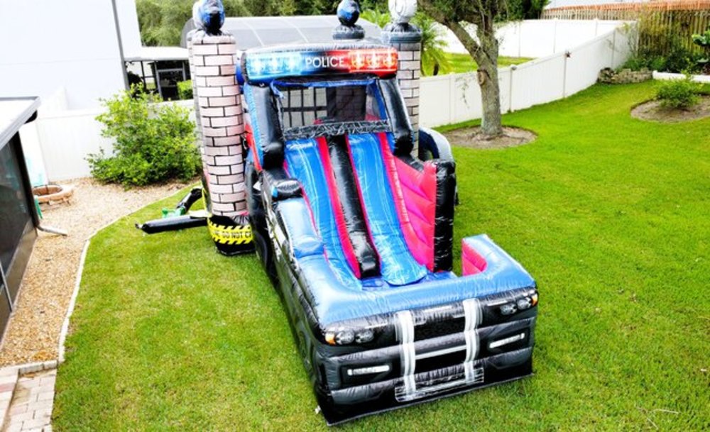 Police car themed bounce house and water slide combo – Orlando party rental