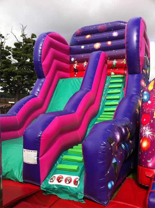 bouncy castle with slide to hire